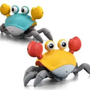 Toyhome Hot Eco-friendly Kids Sensory Interactive Walking Crab Toy con música Sonidos Luces Infant Fun Crawling Crab Baby Toy