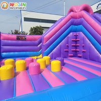 Parc d'aventure gonflable coloré style fête foraine, en PVC robuste et durable, pour un business de location à fort retour sur investissement, avec château gonflable