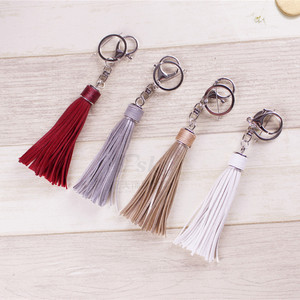 Porte-clés en cuir Yitian avec pompon, pendentif pour sac femme, bijou artisanal élégant, accessoire de trajet - Product Image 3