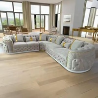 Sofá en Forma de L Tapizado en Tela Chesterfield con Acero Inoxidable Dorado para Sala de Estar, Villa o Casa de Huéspedes