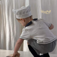 Shorts amples à carreaux avec double bouton décoratif et taille élastique, 98% polyester 2% élasthanne, bas décontractés pour bébés garçons et filles