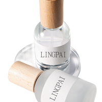 Vente en gros 30ml50ml100ml Flacon de parfum rond en verre transparent dépoli avec bouchon en bois