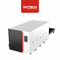 Machine de découpe laser à fibre DXTECH 1530 3000W pour tôles et tubes métalliques avec table d'échange et couvercle de protection entièrement fermé