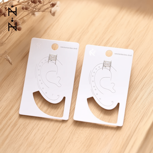 Orecchini a clip a forma di X in acciaio inossidabile, gioielli unisex alla moda - Product Image 3