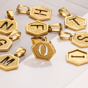 Amuleto con Letras del Alfabeto Hexagonales |   Colgante de Letra Inicial Recortada con Brillo, Chapado en Oro PVD de 18K sobre Acero Inoxidable |   Hipoalergénico, Impermeable - Product Image 1