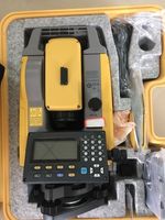 Produit phare et prix réduit : Station totale d'occasion GM52 pour levés topographiques avec trépied, prisme et perche de prisme.