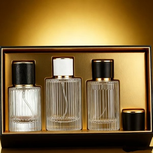 Venta Caliente de Botellas de Perfume de Vidrio Cilíndricas de 30ml 50ml 100ml con Pulverizador, Cabezas de Bomba y <span class=keywords><strong>Tapas.</strong></span> Logotipos Impresos en Serigrafía Personalizados. Embalaje Exterior - Product Image 2