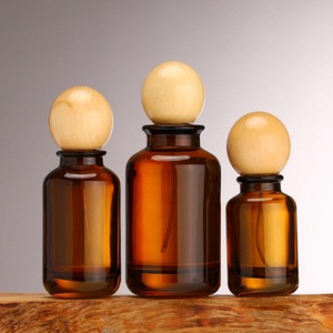 Flacons de parfum en verre à sertir de luxe personnalisés de couleur ambre brun vide de 30 ml, 50 ml, 100 ml avec bouchon en bois en forme de boule/bouchon en plastique - Product Image 1
