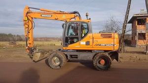 Excavadora de ruedas usada de 14 toneladas modelo <span class=keywords><strong>Doosan</strong></span> DX140W 2023 con motor <span class=keywords><strong>Doosan</strong></span> para operaciones fuera de carretera - Product Image 2