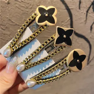 Korean Girl Gold Snap Bobby Pins Cute Fancy Clover Hairpins Custom Luxury Chain Clover Hair Clips For Women