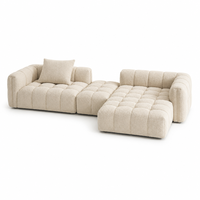 Canapé modulaire Urban Skyline moderne en bouclette crème, garni d'éponge, capitonné, profil bas, idéal pour les salons d'appartements en immeubles de grande hauteur