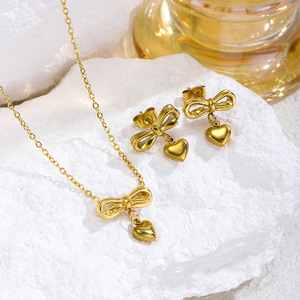 Collar de Joyería de Moda para Mujer, Collar con Colgante de Corazón <span class=keywords><strong>en</strong></span> Forma de Lazo Dorado, Acero Inoxidable, Mariposa, Venta al por Mayor - Product Image 1