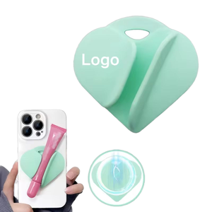 Support de gloss à lèvres en silicone pour coque de téléphone, fixation à ventouse, mini support portable pour gloss à lèvres, idéal pour l'utilisation au lit, pour prendre des photos et décorer. - Product Image 1