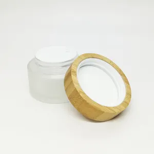 Frasco de vidro vazio com tampa de rosca de bambu para creme de cuidados com a pele, frasco de vidro transparente fosco de 50g, OEM OEM OEM