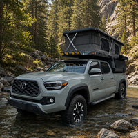 Camper tout-terrain robuste à coque souple pour pick-up grand format avec cuisine et toilettes pour expéditions