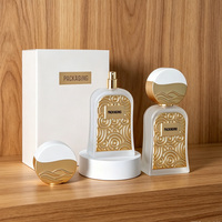 Flacon de parfum vide Eric Design 100 ml en verre givré avec bouchon bicolore or et blanc, boîte cadeau rigide personnalisée pour parfum de luxe
