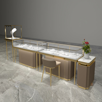Vitrine à bijoux personnalisable en acier inoxydable et verre trempé pour magasin, service complet exclusif fournisseur