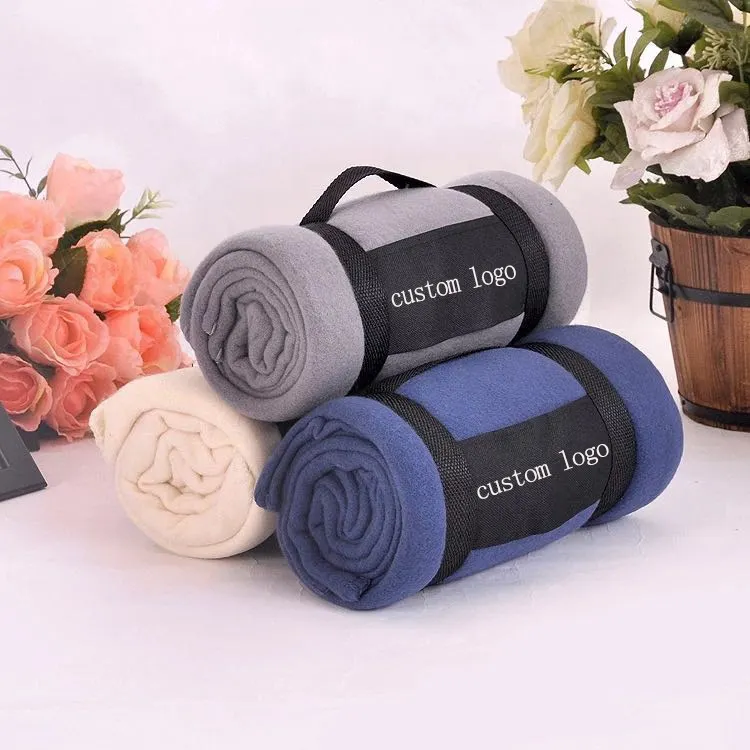 Factory sale customize logo solid color cheap polar fleece blanket with strap for business promotion gift