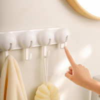 Crochet mural pliable sans perçage pour suspendre vêtements derrière la porte d'entrée, la salle de bain ou la penderie
