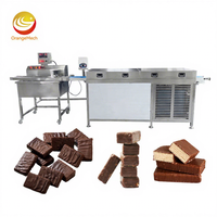 Nouvelle ligne d'enrobage automatique au chocolat ORME avec acier inoxydable 304 pour une haute productivité de revêtement de gâteaux