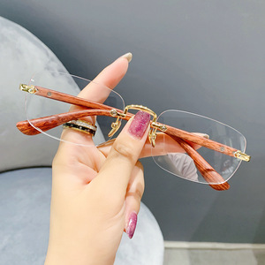 Montature per <span class=keywords><strong>Occhiali</strong></span> Senza Cornice Effetto Legno di Grande Vendita, <span class=keywords><strong>Occhiali</strong></span> <span class=keywords><strong>da</strong></span> <span class=keywords><strong>Vista</strong></span> Senza <span class=keywords><strong>Montatura</strong></span> per Ottica con Cornice Dorata di Marca - Product Image 1