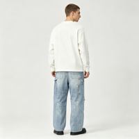 Jean à effet éclaboussures de peinture pour homme, en denim bleu clair délavé, coupe ample à jambe large, avec panneau de poches utilitaires sur la cuisse