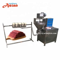Découpeuse d'extrusion de bande de viande de boeuf d'animal familier/ligne de production automatique d'extrudeuse de bande de viande de chien