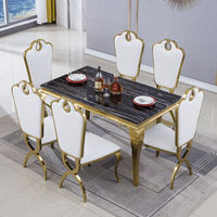 Luxuriöses Nordisches Marmor-Esstisch- und Stuhl-Set mit Edelstahl-Goldbeschichtung für Zuhause & Restaurant