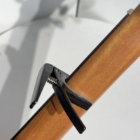 Capo durable de qualité supérieure Accessoires professionnels pour instruments de musique Capo pour ukulélé en gros OEM Fabriqué en Chine