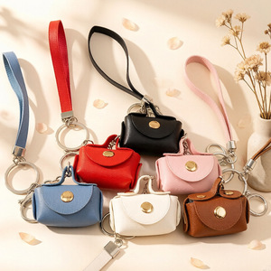 Monedero de PU con cuerda de mano, llavero, colgante creativo para bolso, mini bolsa portátil bonita para guardar auriculares y cables de datos - Product Image 1