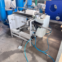 Machine de rembobinage manuelle personnalisée pour rouleaux de papier sulfurisé, film alimentaire et feuille d'aluminium, fabriquée en Chine, à prix compétitif