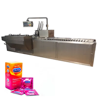 Machine d'emballage automatique horizontale pour préservatifs en sachets, machine d'emballage en boîtes de carton