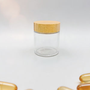 Envases Redondos <span class=keywords><strong>de</strong></span> Bambú <span class=keywords><strong>de</strong></span> 90 ml, Frascos <span class=keywords><strong>de</strong></span> Vidrio Cosméticos Vacíos, Fabricante YMP HM-096 con Tapa <span class=keywords><strong>de</strong></span> Bambú - Product Image 1