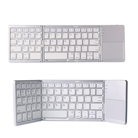 Clavier sans fil universel pliable mini trois systèmes avec pavé tactile en plastique certifié CE FCC ROHS pour tablette et téléphone
