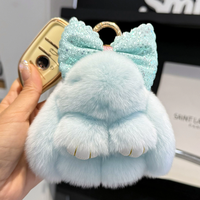Porte-clés mini lapin en fausse fourrure moelleuse avec longues oreilles, nœud en strass scintillant, porte-clés en fourrure de lapin