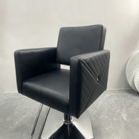 Chaise de barbier ergonomique moderne, chaise de salon noire haut de gamme avec base hydraulique robuste pour les stylistes professionnels