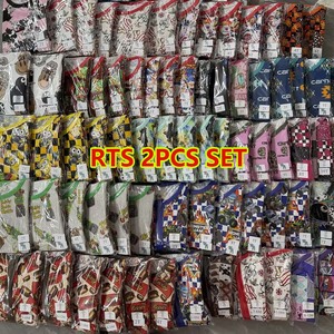 Prêt à expédier – Boîte mystère en bambou – Vente en gros de pyjamas pour bébé – Doux, taille et imprimé aléatoires, fermeture éclair discrète, lavable, unisexe - Product Image 1