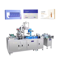 Machine d'emballage sous film transparent pour boîtes de biscuits, boîtes de dentifrice et boîtes de produits de santé