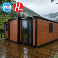 Maison conteneur en membrane d'éthylène tétrafluoroéthylène, aérogel de silice hydrophobe et nid d'abeille en aramide pour zone de villégiature écologique forestière