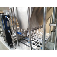 Machine de remplissage et de scellage pour pots de gelée et pots de miel