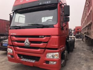 Camion tracteur d'occasion Sinotruk Howo NX 6x4, cabine à toit plat, conduite à gauche, diesel Euro 2, 351-450 CV, 31-40 tonnes, moteur Weichai robuste - Product Image 1