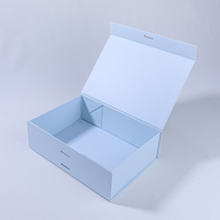 Boîte cadeau rigide pliable bleue sur mesure pour économiser de l'espace avec fermeture magnétique et ruban de fermeture