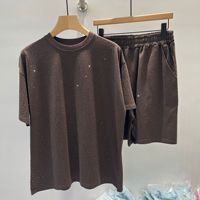 Kaos Katun Rajut Lengan Pendek Gaya Kasual Manis-Keren Musim Panas 2026 Kerah Mandarin Wanita Fashionable dan Awet