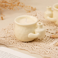 Fabricant de bougies OEM à faible MOQ, bougies parfumées personnalisées, bougies en pot de céramique mignonnes à l'effigie de dessins animés, bougies de soja parfumées