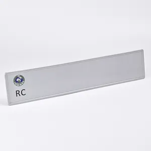 Fábrica personalizada 52*11cm matrícula borde en relieve película reflectante blanca chapa de aluminio placa de matrícula de coche en blanco