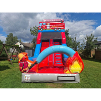 Château gonflable commercial pour enfants avec toboggan, thème camion de pompiers, idéal pour la location événementielle