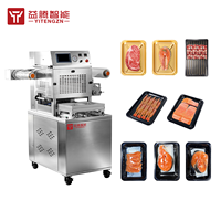 Machine d'emballage sous vide continu YT-TT350 pour produits frais avec équipement de scellage pour poissons et volailles, et aliments cuits