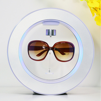 Présentoir de lunettes de soleil en lévitation Offres Spéciales support de lunettes de vue flottant magnétique présentoir de magasin de lunettes de soleil rotatives
