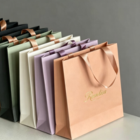 Sac en papier blanc de marque Idecor, recyclable, grande quantité disponible, avec poignée sérigraphiée, design de logo personnalisé, luxe léger