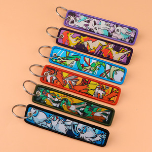 Al por mayor Llavero de tela tejida colorido de anime con estampado Eeveelutions, correa para llavero, adorno colgante para bolso, pequeño regalo - Product Image 4
